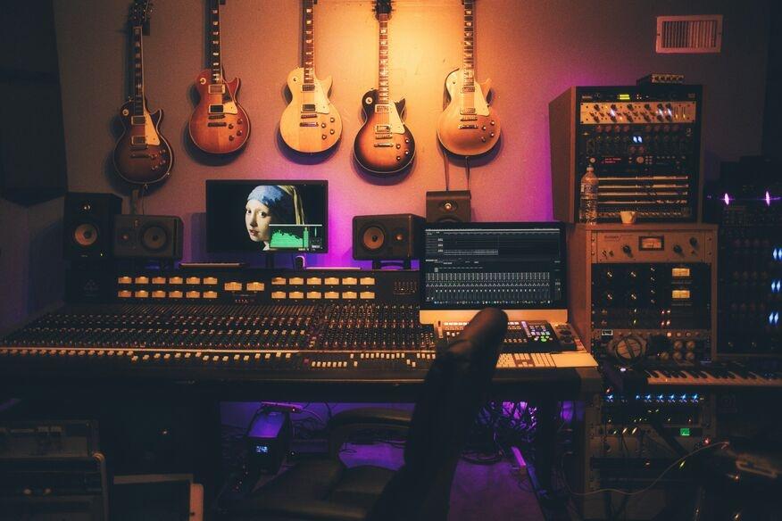 Guitar and computer monitor